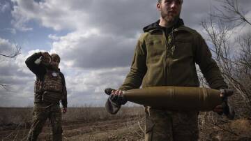 Ukraine's military says fierce fighting continues, with 121 battles ongoing in the past 24 hours. (AP PHOTO)